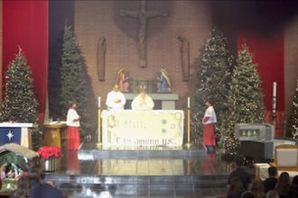 Last known image of Corpus Christi Church: Mgr Liam Kidney celebrating Mass with schoolchildren hours before fire destroyed the church. (Archdiocese of LA/Corpus Christi Church)