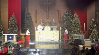 Last known image of Corpus Christi Church: Mgr Liam Kidney celebrating Mass with schoolchildren hours before fire destroyed the church. (Archdiocese of LA/Corpus Christi Church)