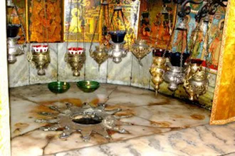 Star of hope marks the place of Jesus' birth at the Church of Nativity in Bethlehem