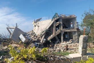 House destroyed by Israeli airstrike in southern Lebanon © ACN