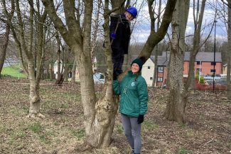 Teacher Jessica Jones with pupil at St Augustine's Forest School in Runcorn