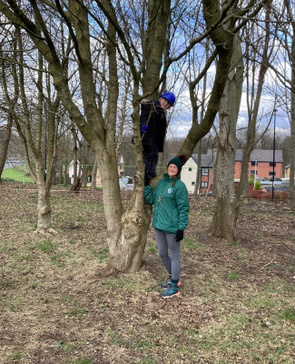 Teacher Jessica Jones with pupil at St Augustine's Forest School in Runcorn