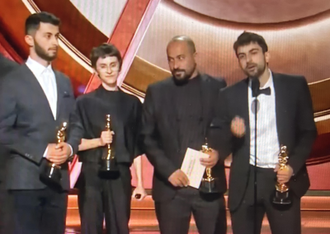 Co-directors Basel Adra, Rachel Szor, Hamdan Ballal and Yuval Abraham at the Oscar ceremony