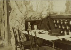 Portrait of Paul Verlaine drinking absinthe at the "Café François 1er", 69 boulevard Saint-Michel, 5ème arrondissement, Paris,  by Paul François Arnold Cardon, called Dornac,  1892,