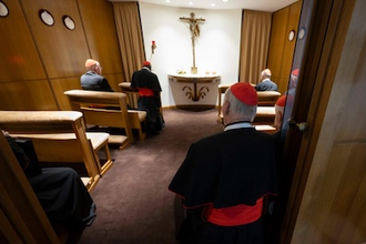 Cardinals pray before the Blessed Sacrament in chapel near the New Synod Hall - Vatican Media