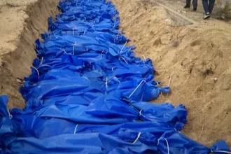 One of the hundreds of mass graves in Gaza. Image: ICN screenshot