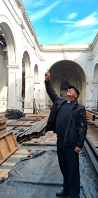 Fr Jaime Tocornal in the ruined church after the 2020 attack © ACN
