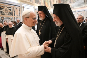 Pope greets participants