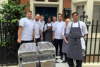 Clemente Attolico and colleagues with the delicious lunches they are taking to Farm Street.