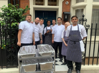 Clemente Attolico and colleagues with the delicious lunches they are taking to Farm Street.