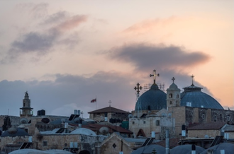 22 November 2022, Jerusalem, Palestine: Sunset over the Jerusalem old city and east Jerusalem. Photo: Albin Hillert/WCC
