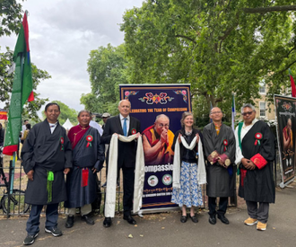 Sir Ian Duncan Smith and guests at the Tibetan Peace Park celebration for the Dalai Lama's 90th birthday and the Year of Compassion