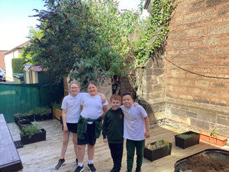 Members of St Alban's Mini Vinnies who helped build the Laudato Si' Garden