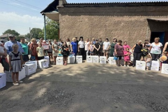 Families in Kharkiv receiving aid parcels