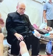 Fr Gabriel being treated in hospital