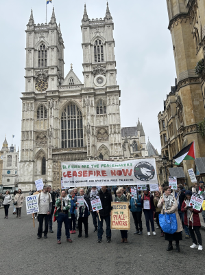 One placard reads: 'Only justice can bring peace to Israel and Palestine'