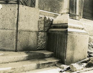 Shadow on steps of Sumitomo Bank Company, Hiroshima 1945. Photo by US Armed Forces.