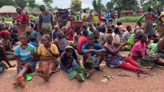 Women and children in sit-down protest