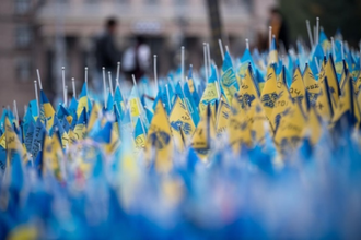 Thousands of Ukrainian flags have been placed at Independence Square in Kyiv, in memory of those whose lives have been lost since the invasion of Ukraine by Russia. Photo: Albin Hillert/LWF