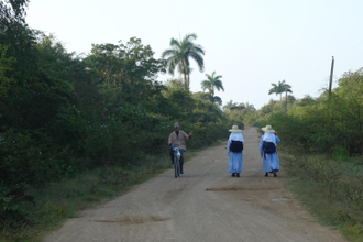 Sisters walk on remote roads Santa Clara, where repairs to cars are urgently needed (Image: ACN).
