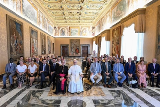 Pope with French officials. Image: Vatican Media