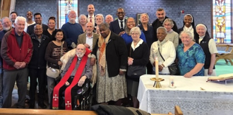 Fr Teave with family and friends on the day