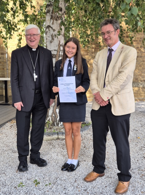 Isabel (centre) with Bishop James Curry and Dr Jeremy Pilch
