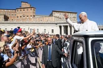 Pope waves to crowds on the Jubilee for Justice