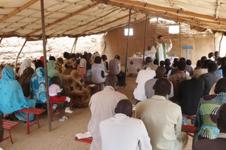 Fr Jorge Naranjo with his community in Sudan