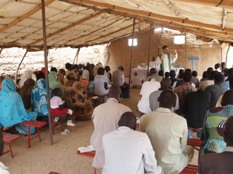 Fr Jorge Naranjo with his community in Sudan