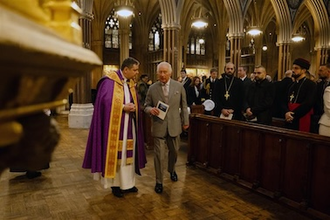 King Charles with Fr Dominic Robinson during the Advent Service at Farm Street church