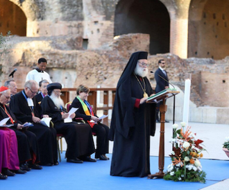 Theodoros II delivers the reflection during ecumenical prayers at the Colosseum. Photo:  Community of Sant'Egidio