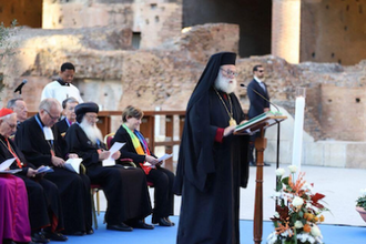 Theodoros II delivers the reflection during ecumenical prayers at the Colosseum. Photo:  Community of Sant'Egidio