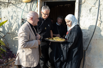 Archbishop of York (left) visiting a Palestinian home, Credit: Andrea Krogmann, Office of the Archbishop of York