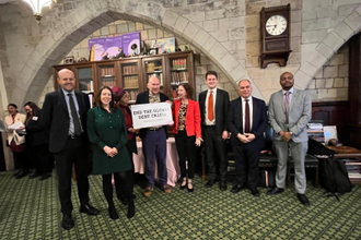 Alex Macqueen with MPs at Parliament, Credit: CAFOD