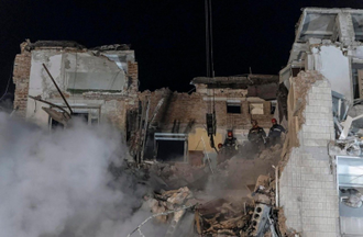 Rescue efforts continue at Ternopil residential building after Russian strikes, Credit: ANSA