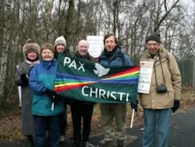 Bishop McMahon with campaigners at Peace Service at Aldermaston Feb 2010