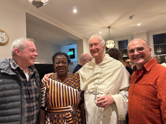 Timothy Radcliffe with CAPS team members at the reception at the London Jesuit Centre after Mass