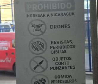 Costa Rica bus station sign states magazines, newspapers and Bibles, among prohibited items prohibited in Nicaragua. Image: CentroAmérica360