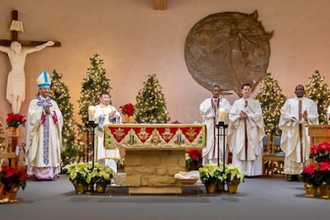Bishop Earl Fernandes celebrates Mass