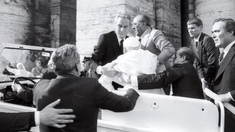 Angelo Gugel standing on left, holds Pope John Paul I's arm after he was shot on May 13, 1981
