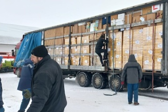 Loading up lorries - Image by Cardinal Krajewski
