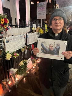 Father John McGowan at Monday's vigil for Alexei Navalny