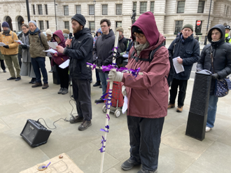 Prayers outside the Mod.  Image Ellen Teague