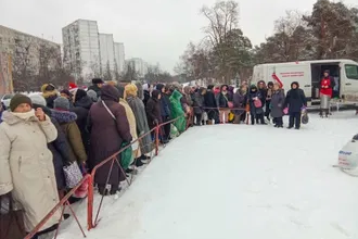 Emergency food line. Image: CAFOD