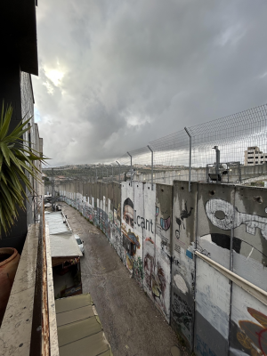 Dark sky over the bleak Separation Wall surrounding Bethlehem - ICN/JS