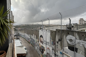 Dark sky over the bleak Separation Wall surrounding Bethlehem - ICN/JS