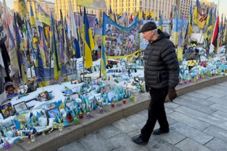Cardinal visits memorial in Kyiv.
