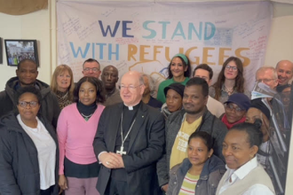 Archbishop Moth with JRS team