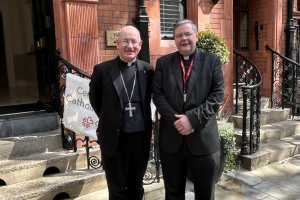 Archbishop Richard Moth with Fr Dominic Robinson outside the centre